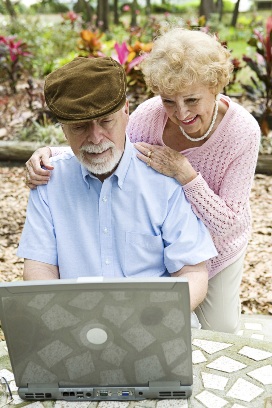 Man and Woman looking at computer